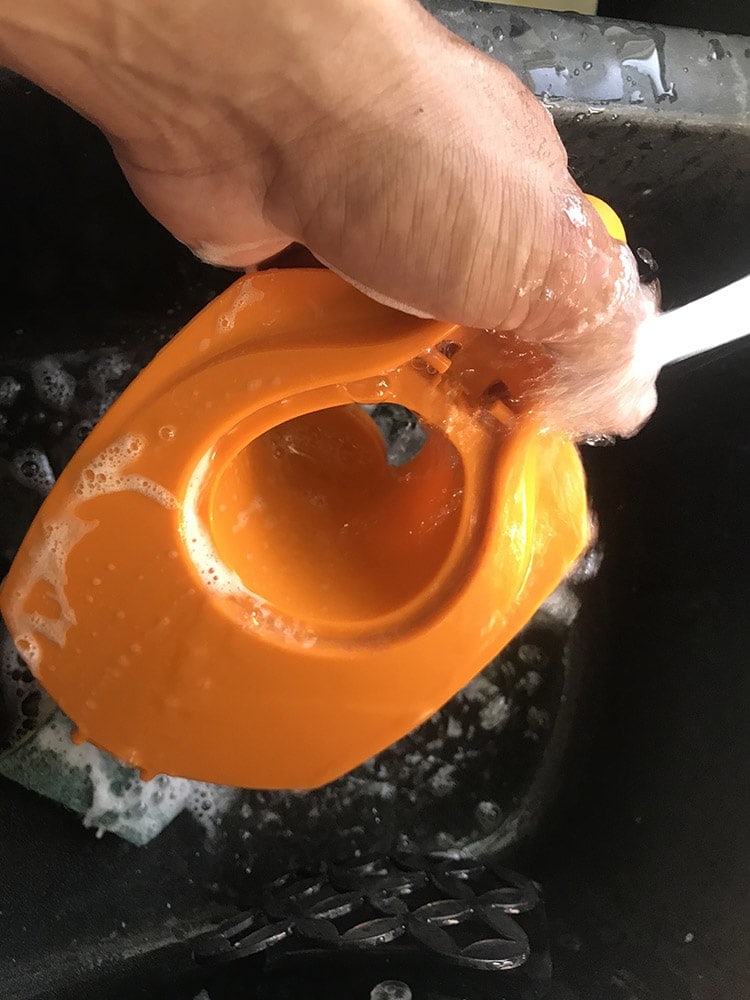 cleaning the lid of Brita Water Filter Pitcher