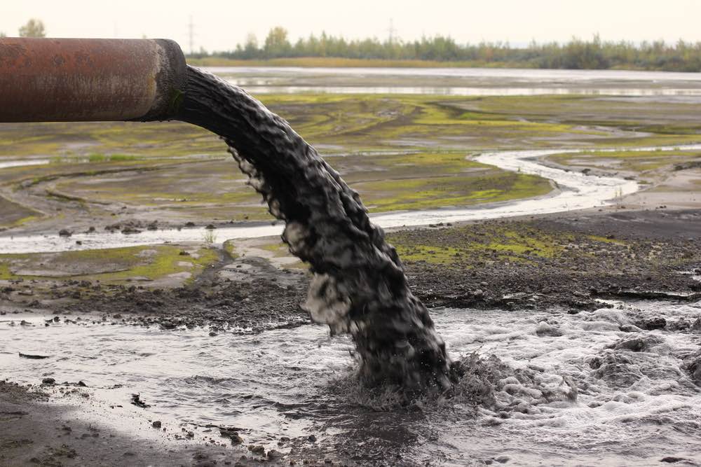 dirty water pollution into river