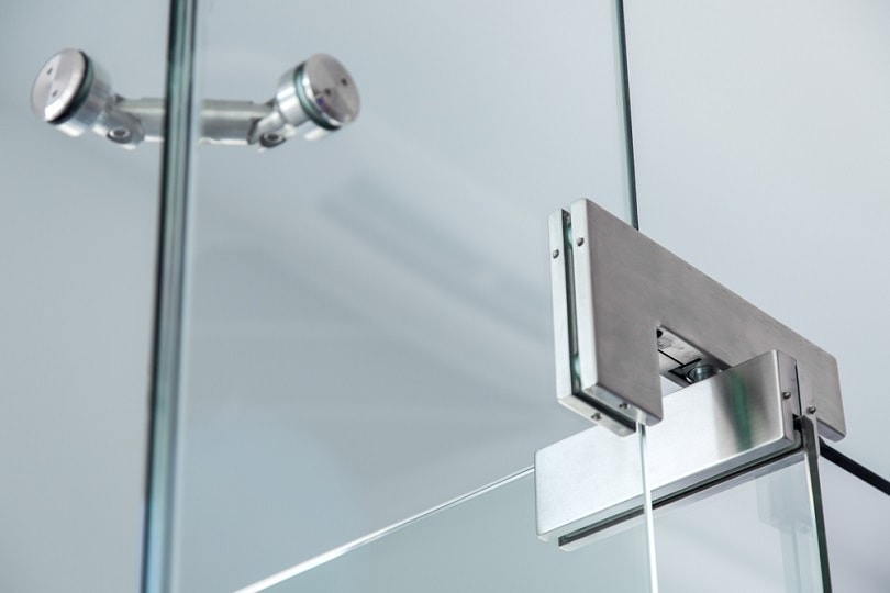 glass door pivot hinge_Bespaliy_shutterstock