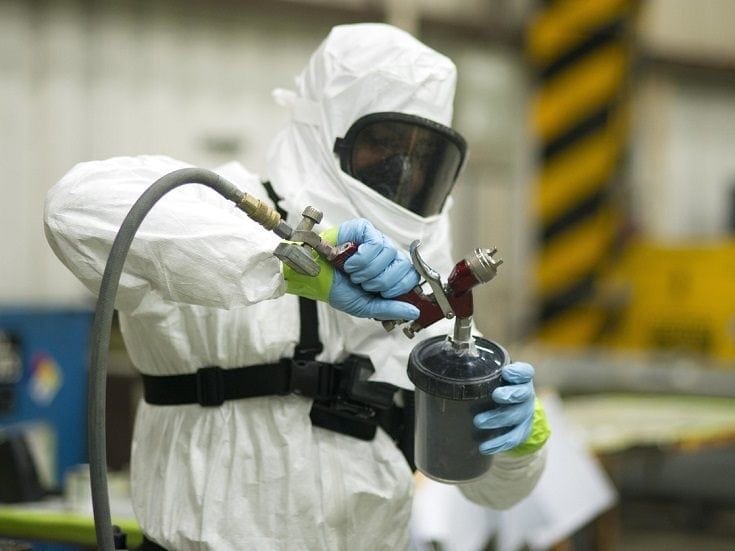 Pouring Paint into Container