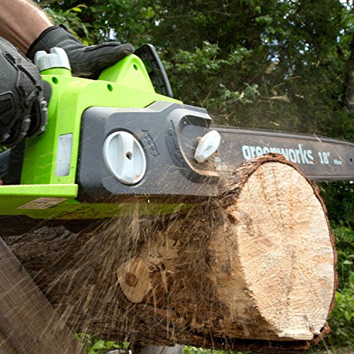 a chainsaw cutting wood