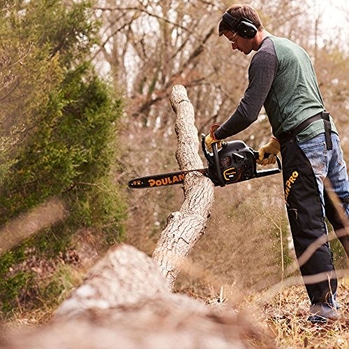 A man using a chainsaw