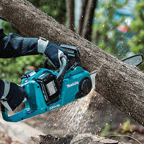 cutting log with Makita chainsaw
