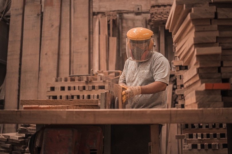 A man woodworking