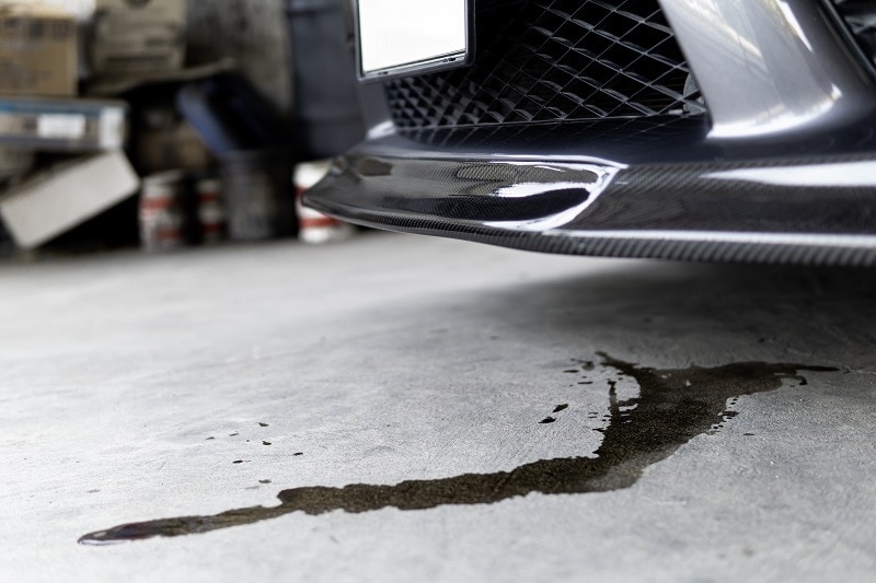 Car Oil Spill_shutterstock_NONGASIMO