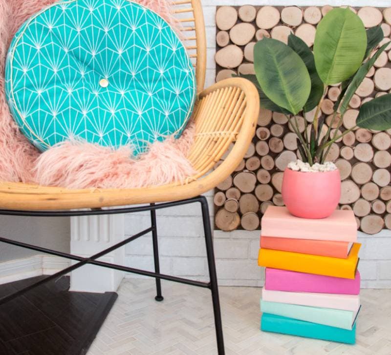 DIY colorful stacked book plant stand