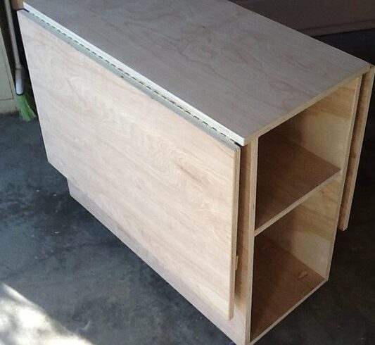 Folding sewing table