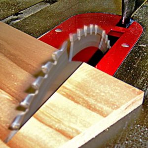 Table saw cutting some wood