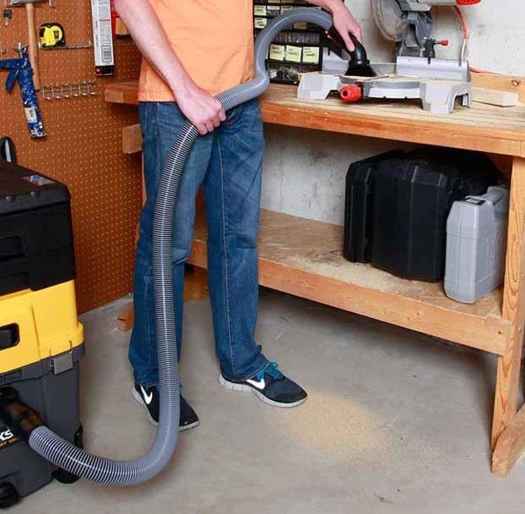 WS17823A Wet Dry Vacuum Hose, 1 7/8-Inch man using