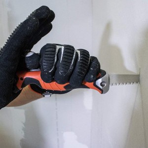a tool cutting drywall