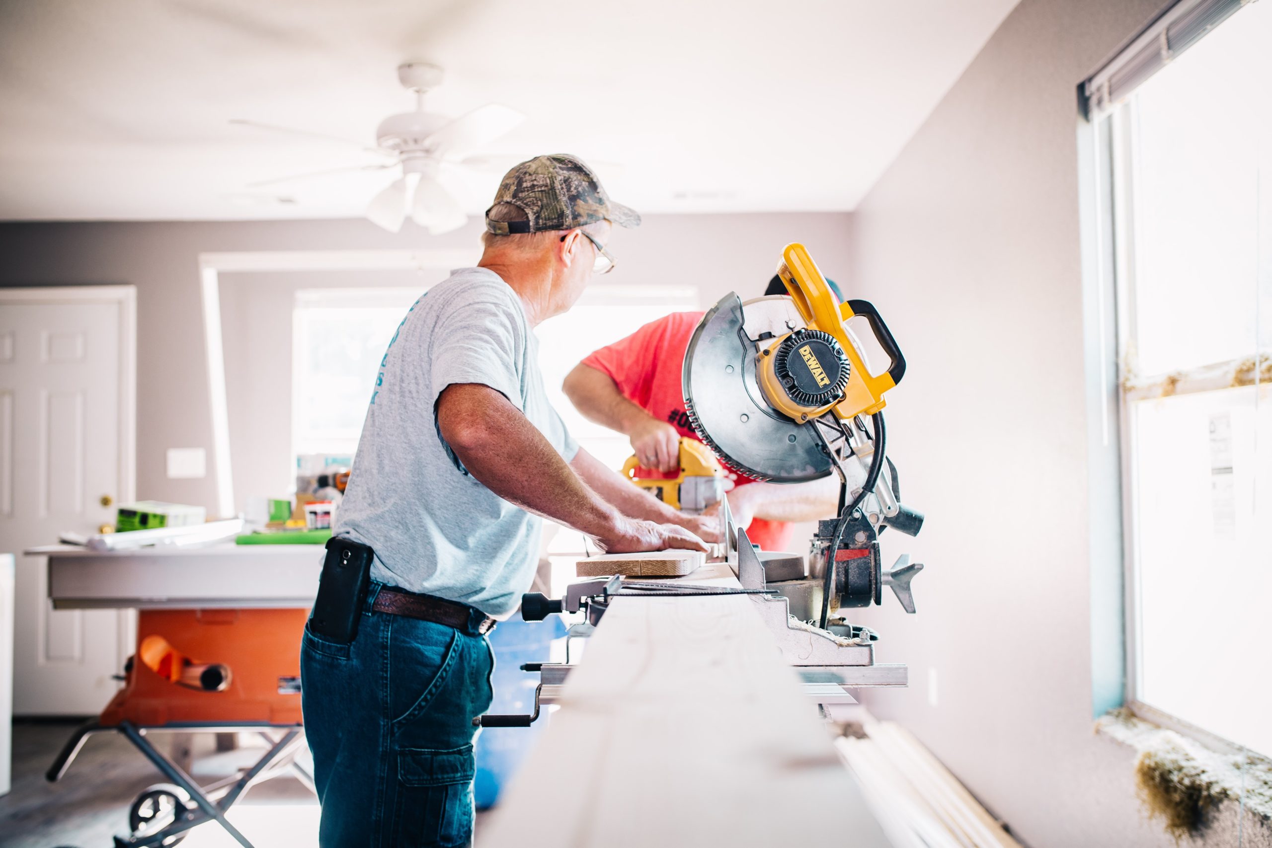 man using a mitre saw