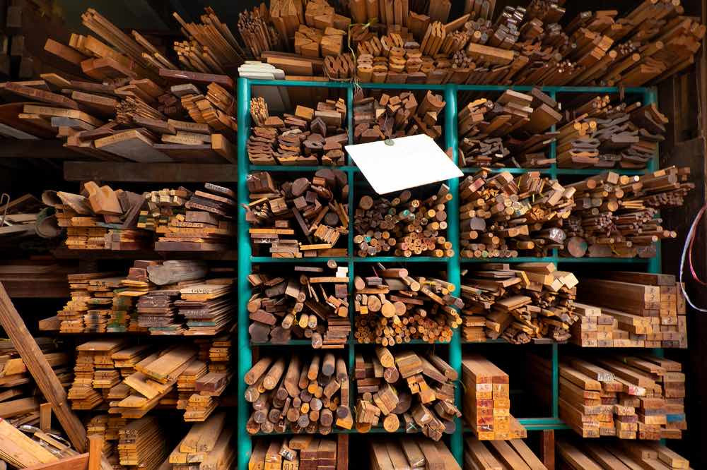 assorted lumber on shelf