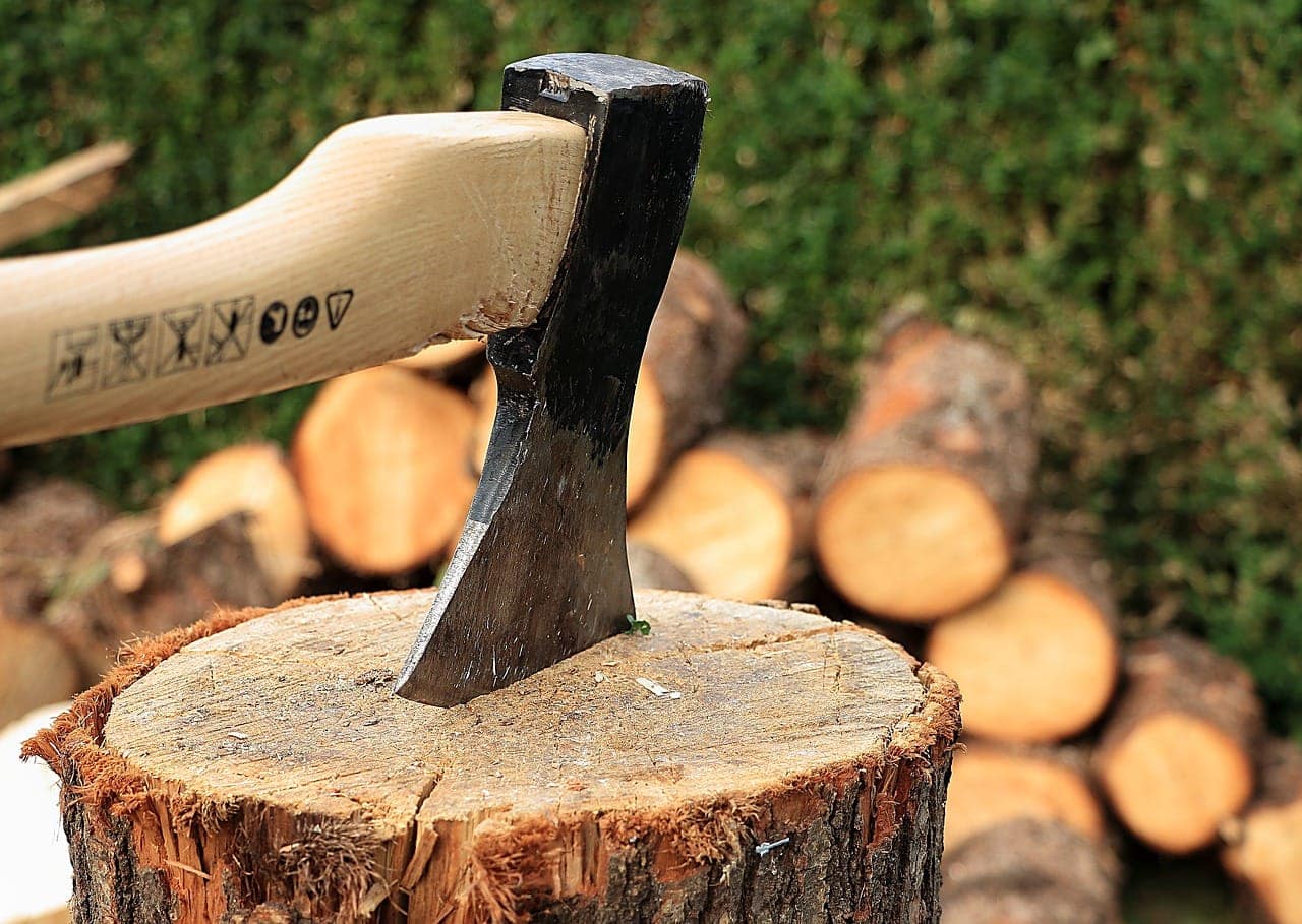 axe in wood block