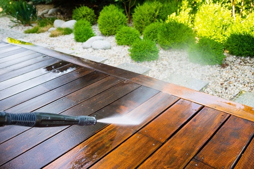 cleaning terrace with a power washer_bubutu_shutterstock