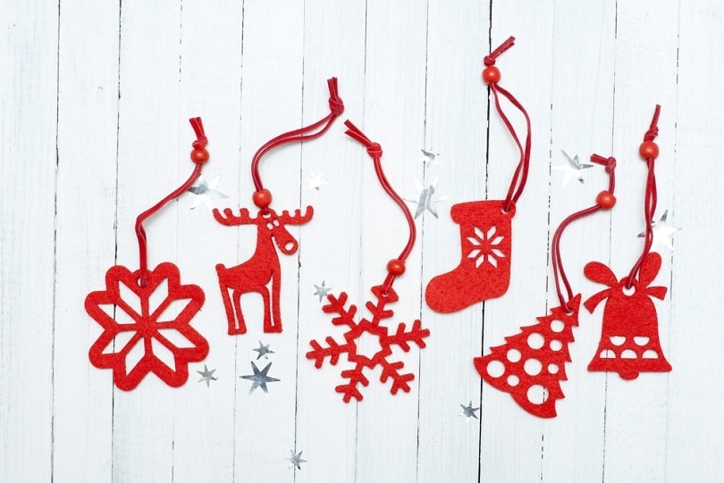 felt-christmas-ornaments-on-white-wood