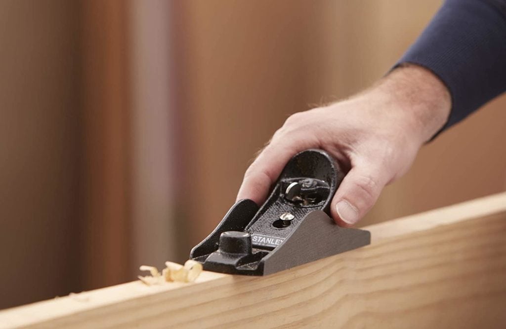 hand holding Stanley 12-220 Block Plane
