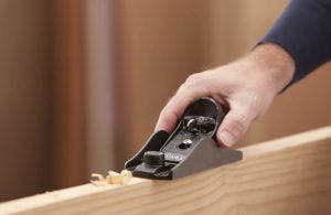 hand holding Stanley 12-220 Block Plane