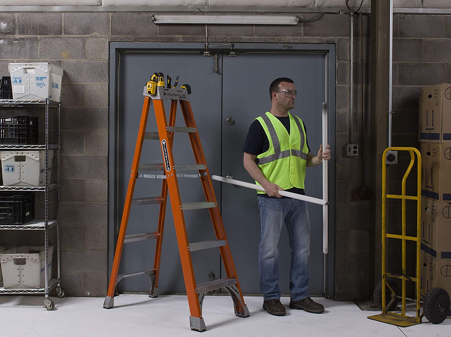 man beside Louisville 6' Fiberglass Step Ladder