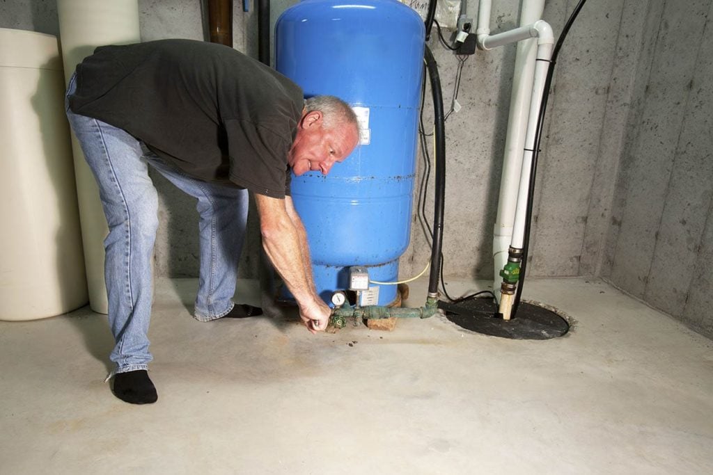 man near the sump pump