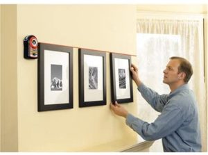 man using BLACK+DECKER BDL170 Line Laser