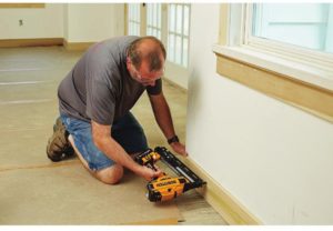 man using BOSTITCH Max Finish Nailer Kit