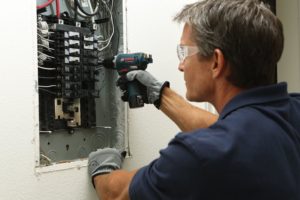 man using Bosch PS32-02 Cordless Drill Driver