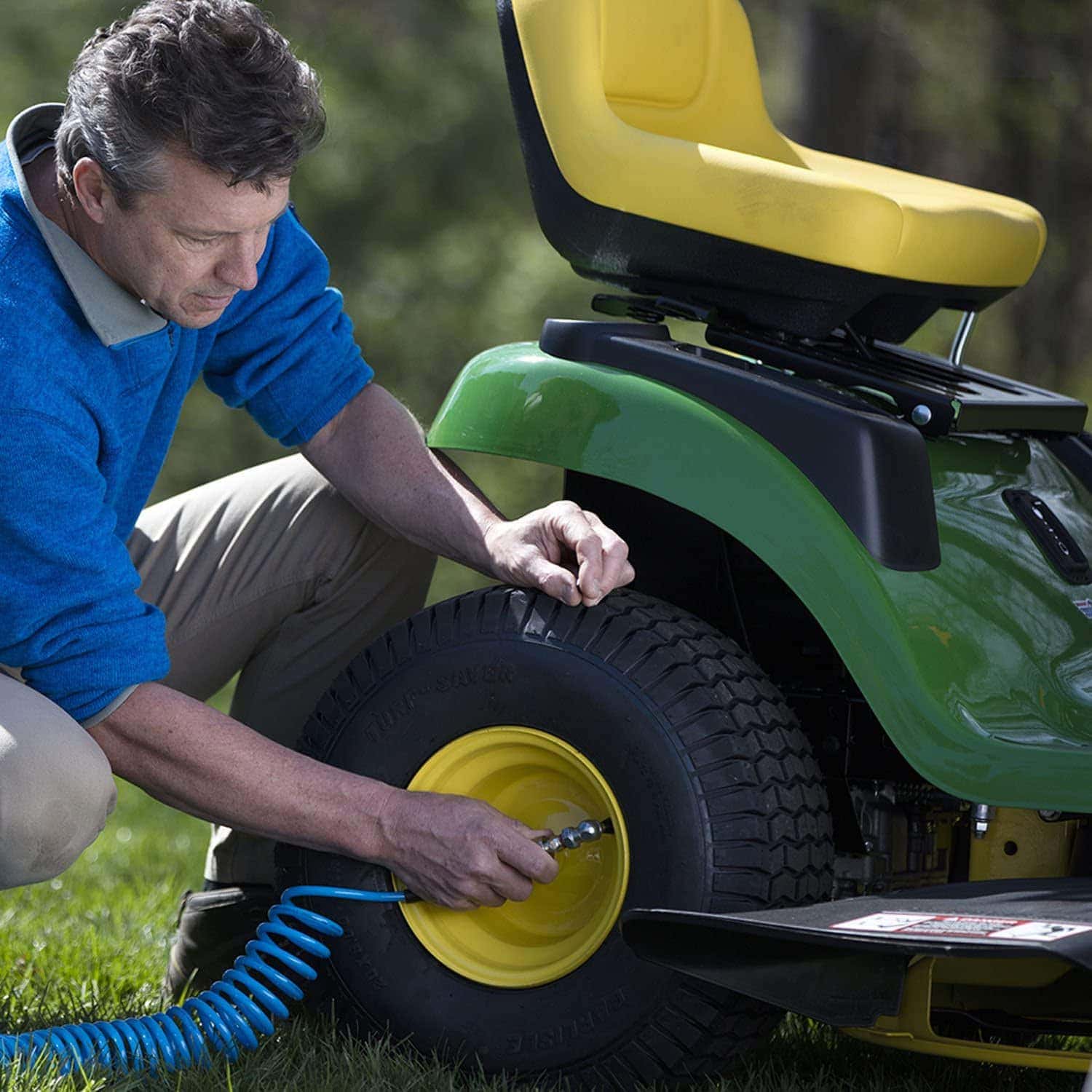 man using Campbell Hausfeld DC060500 Portable Air Compressor