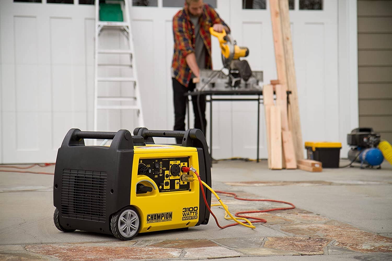 man using Champion 3100-Watt RV Ready Portable Inverter Generator