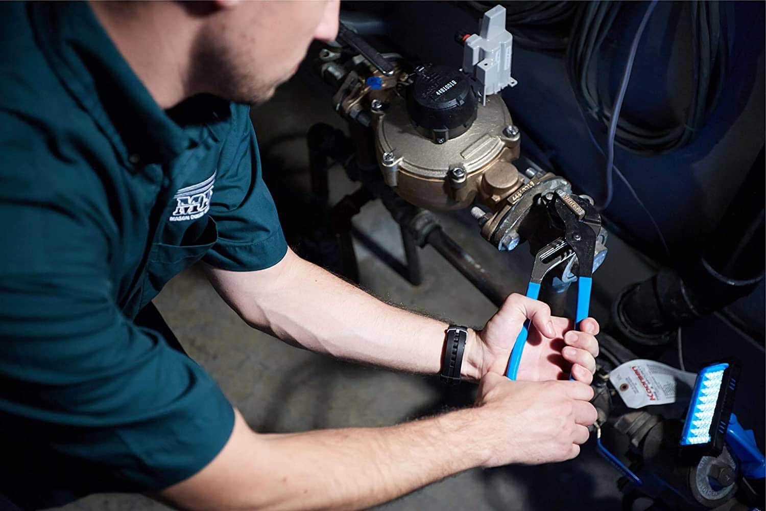 man using Channellock 440 Tongue and Groove Pliers