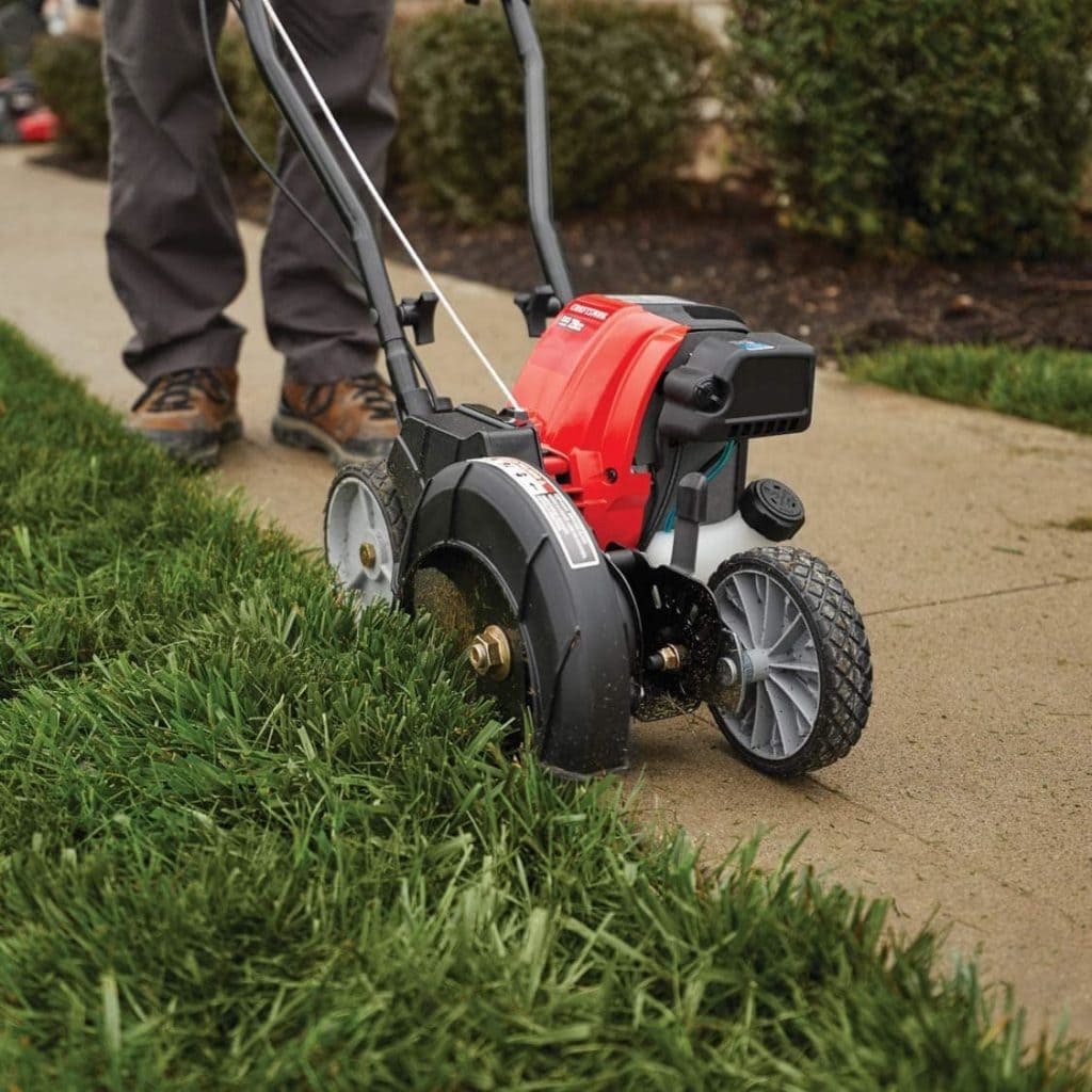 man using Craftsman E405 Grass Lawn Edger