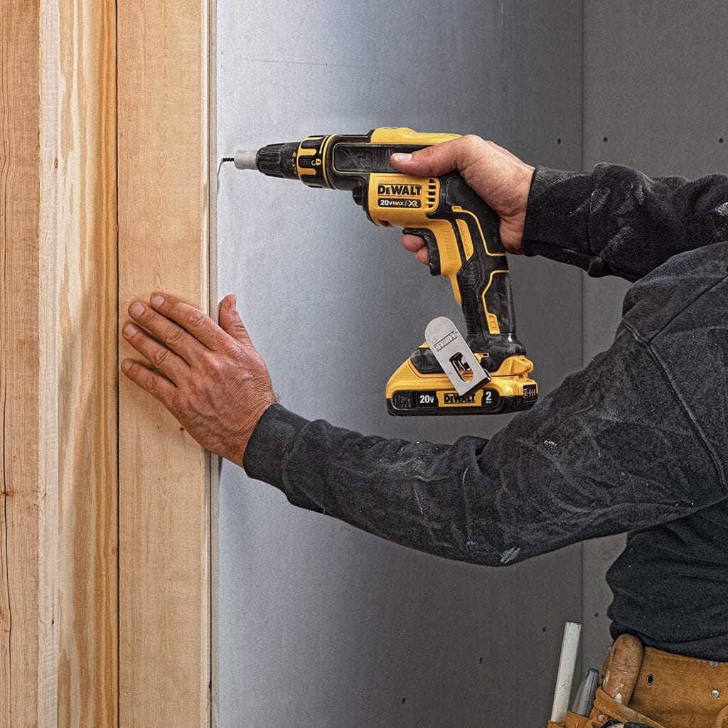 man using DEWALT 20V MAX-XR Drywall Screw Gun