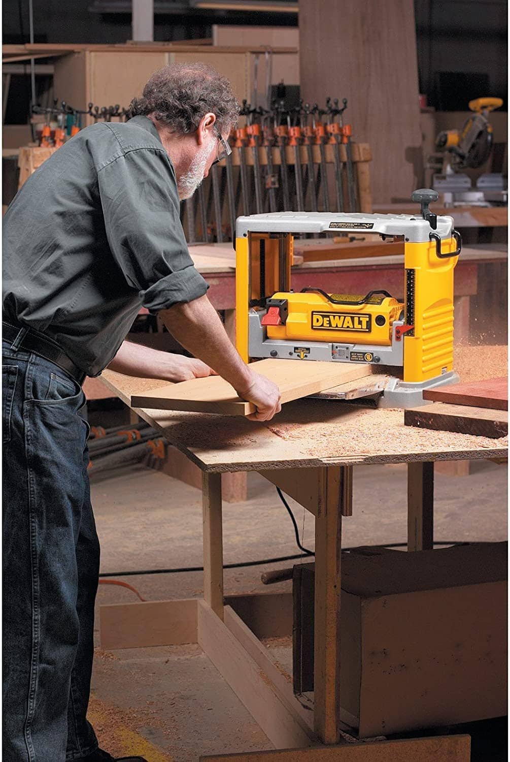 man using DEWALT Benchtop Planer