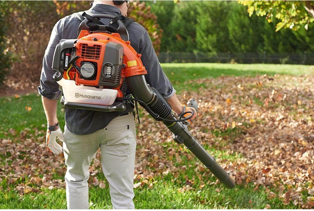 man using Husqvarna 150BT