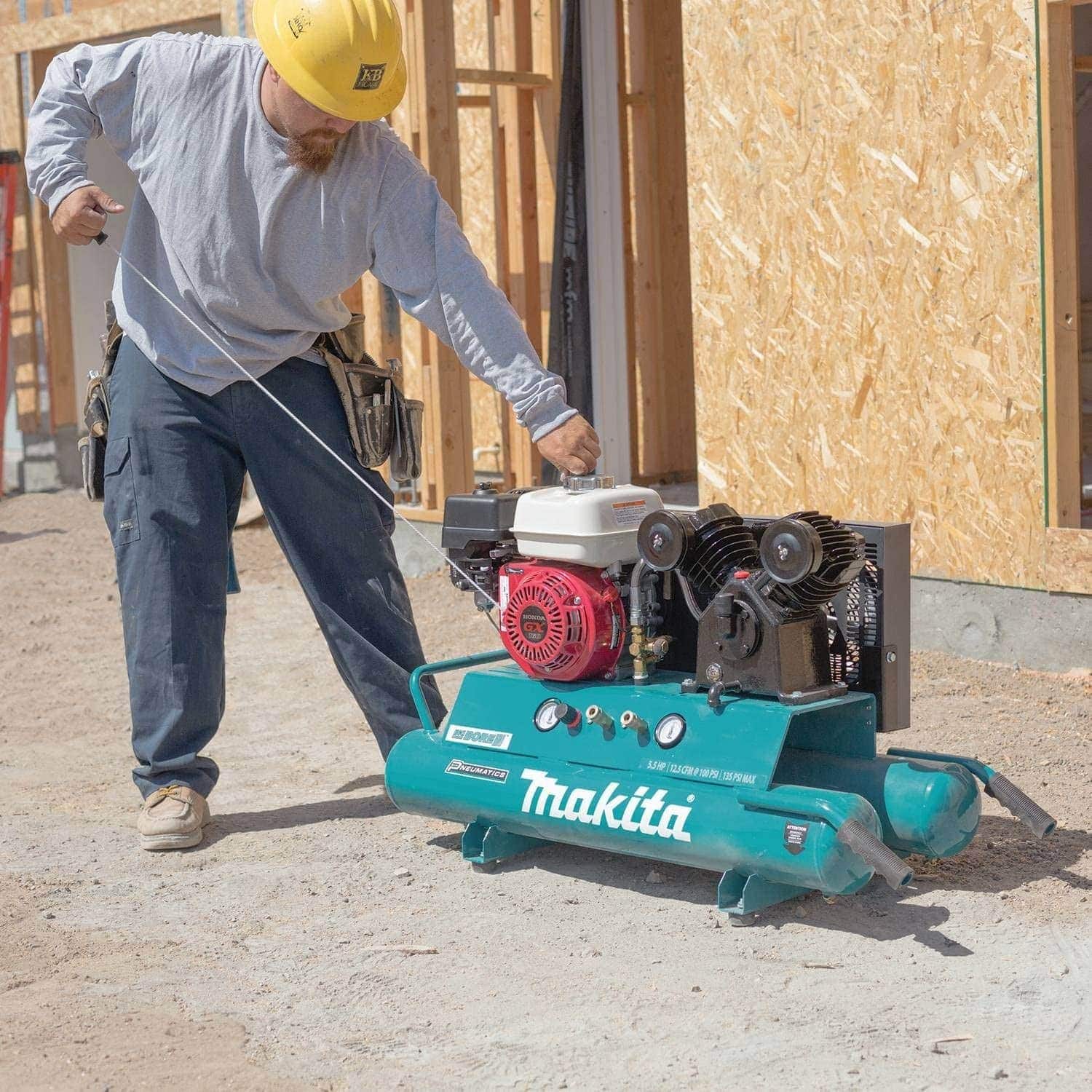 man using Makita MAC5501G Gas Air Compressor