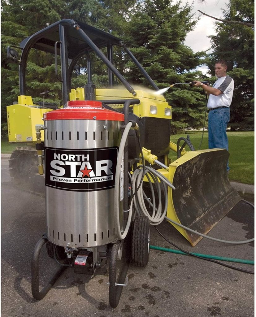 man using Northstar Electric Hot Water Pressure Power Washer