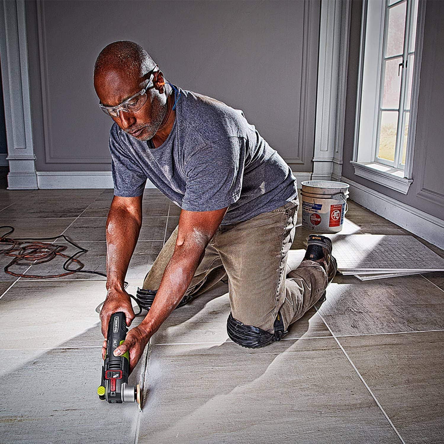 man using Rockwell RK5151K Sonicrafter F80 Oscillating Multi-Tool