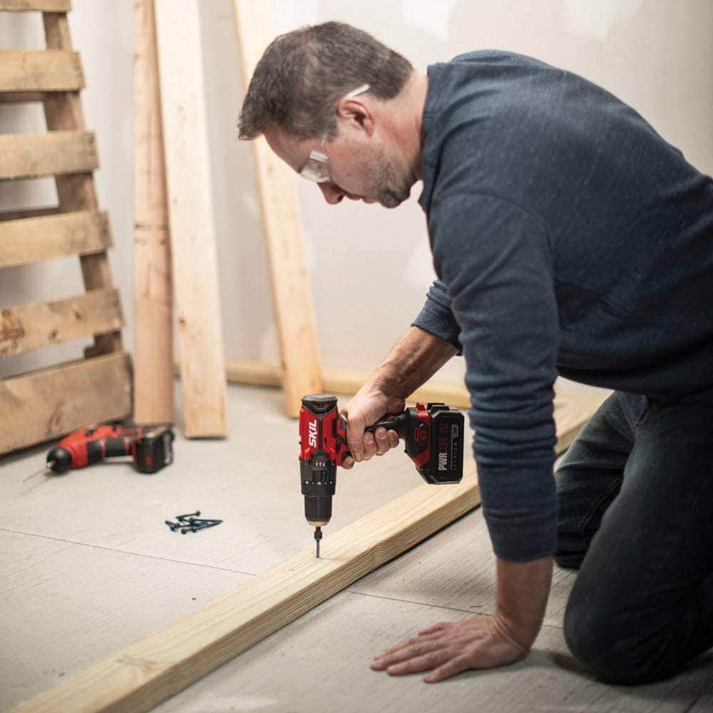 man using SKIL HD527802 Hammer Drill