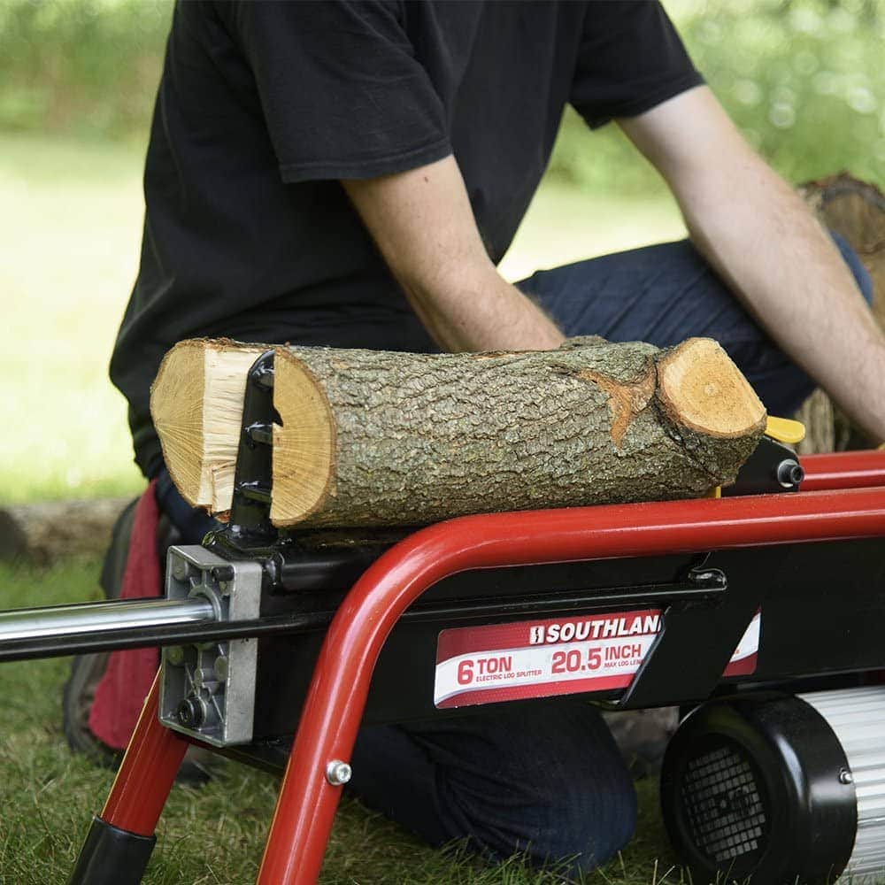 man using Southland Outdoor Power Equipment SELS60 Electric Log Splitter