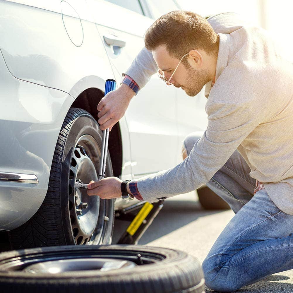 man using a BULLTOOLS 3:8-inch Drive Dual-Direction Click Torque Wrench
