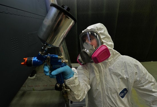 man using spray paint