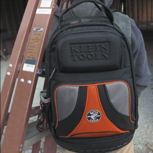 man with Klein Tools 55421BP-14 Tool Bag Backpack