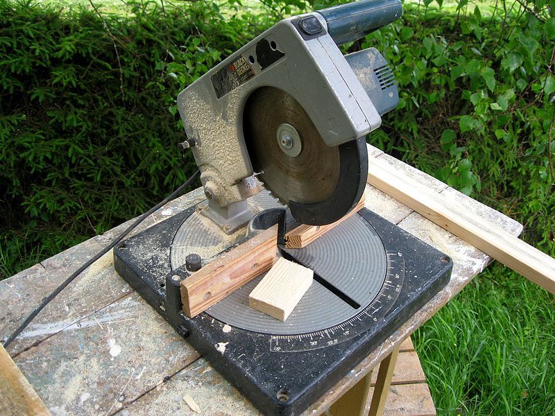 miter saw cutting wood