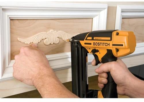 person using BOSTITCH BTFP12233 Brad Nailer
