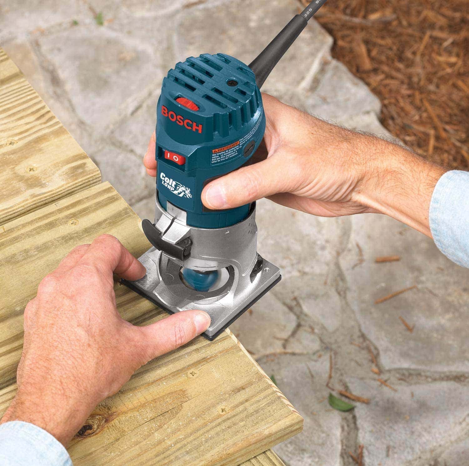 person using Bosch PR20EVS Router Tool