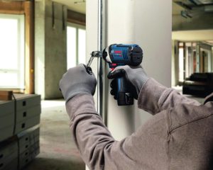 person using Bosch PS41-2A Impact Driver