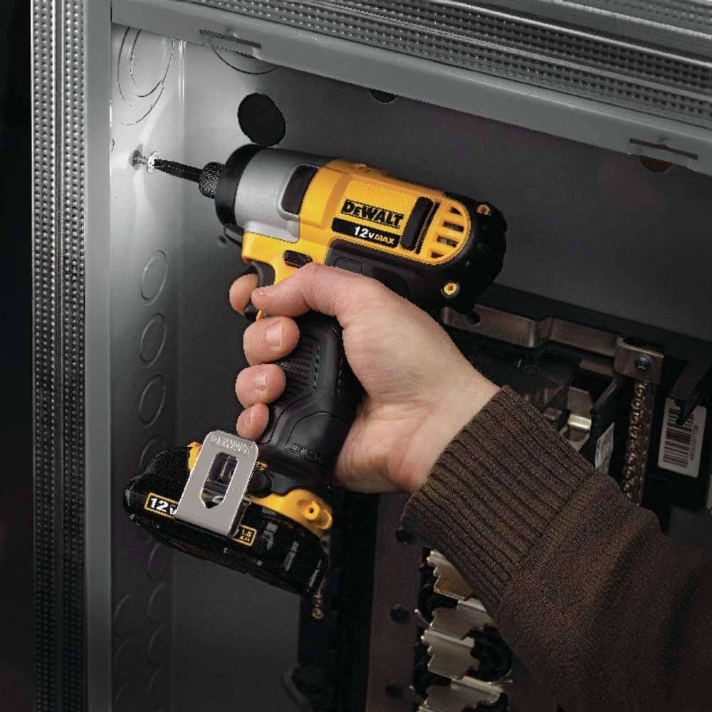 person using DEWALT DCF815S2 Impact Driver