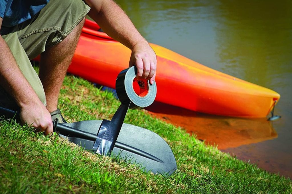 person using Gorilla Black Tough & Wide Duct Tape