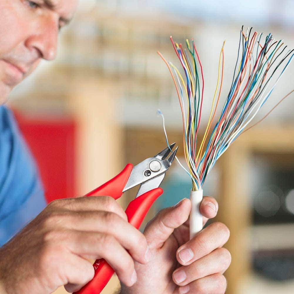 person using IGAN-170 Wire Cutters