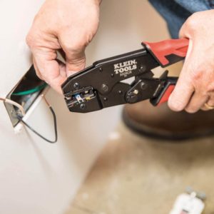 person using Klein Tools 3005CR Wire Crimper Tool