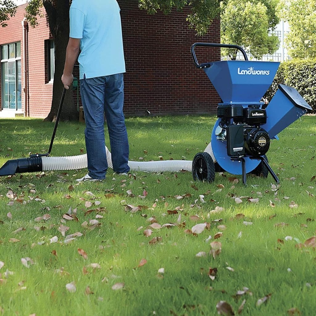person using Landworks Wood Chipper